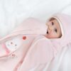 Kokkupandav magamistekk/vannilina Snugle wrap Mesilane  Baby Fehn 0-10kuud – pilt 4
